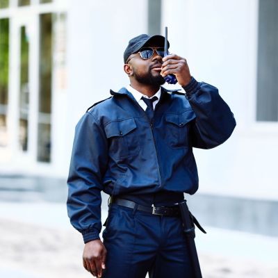 African-American security guard outdoors